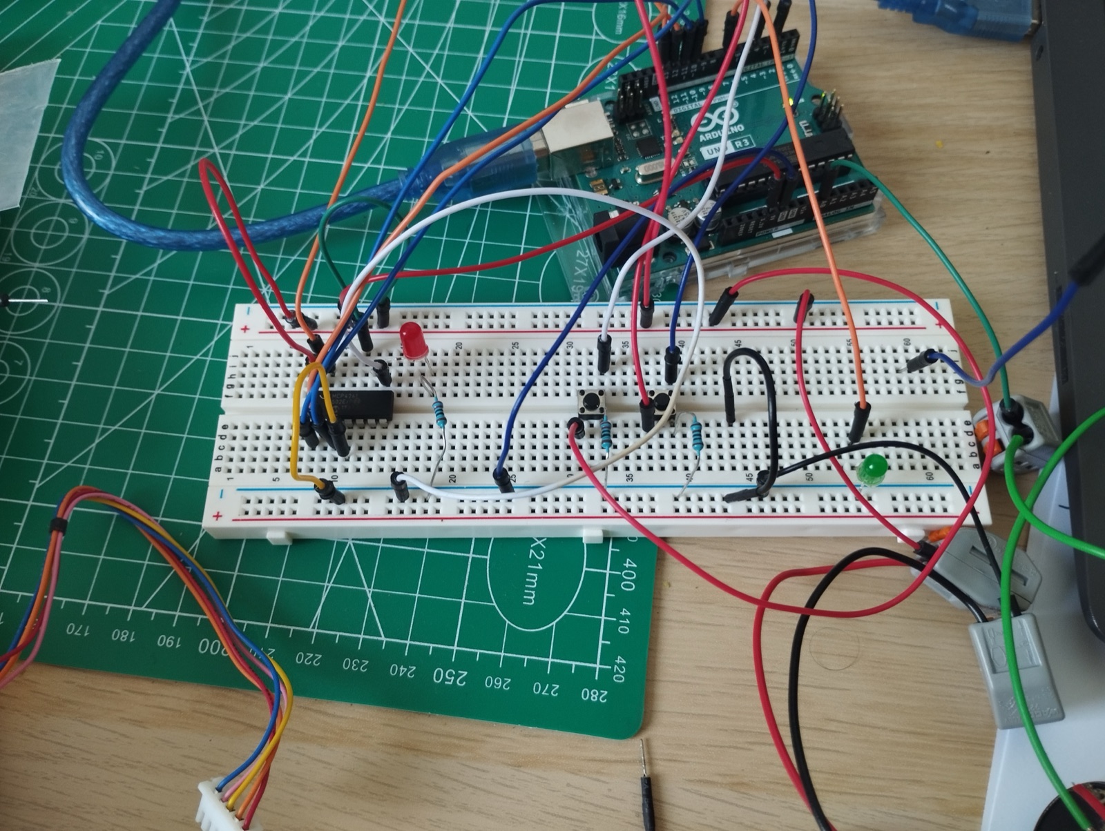 Breadboard prototype of the control electronics, built around an Arduino Uno with a digital potentiometer and switching for motor control.